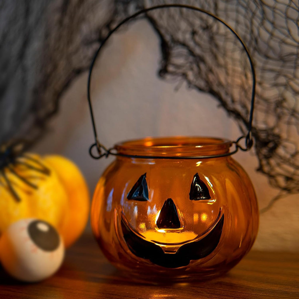 Halloween Pumpkin Glass Candle Holder Lantern with Ghost Face – Orange Hanging Tealight Jar with Metal Handle for Spooky Home & Party Decor