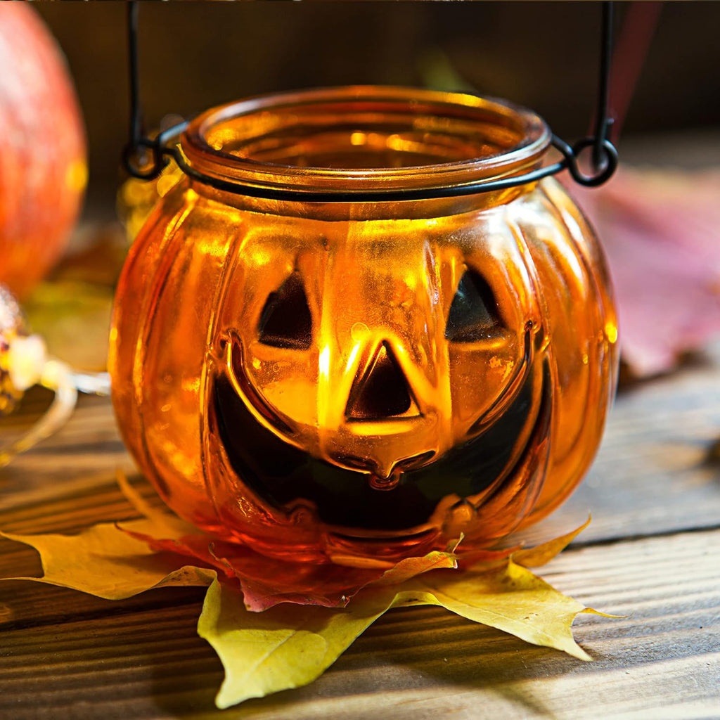 Halloween Pumpkin Glass Candle Holder Lantern with Ghost Face – Orange Hanging Tealight Jar with Metal Handle for Spooky Home & Party Decor
